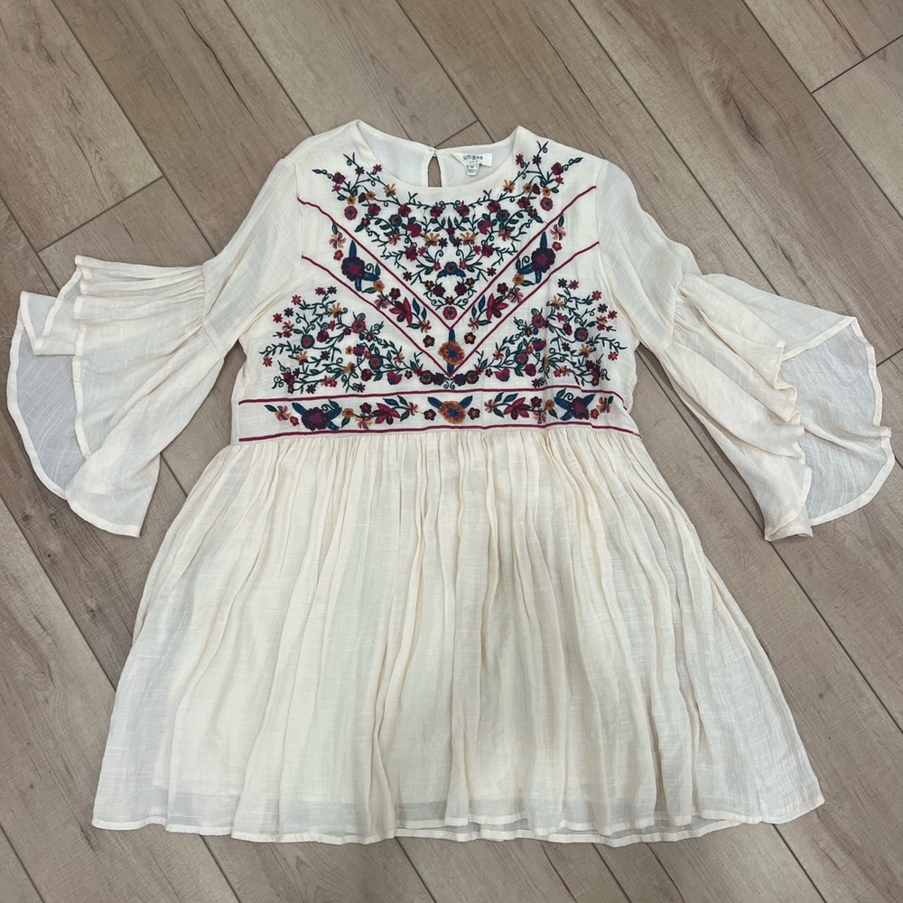 Cute dress with Bell sleeves and embroidered top